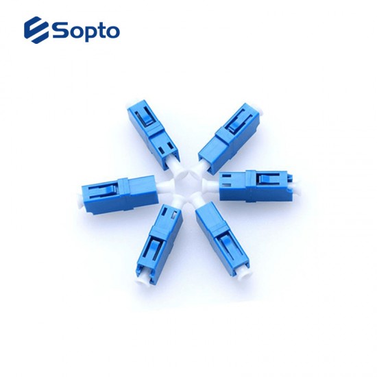 SOPTO Adaptor Simplex SC/SC Female to Female UPC SM Plastic shell with Ears with Spring strip SPAD-SCF-SCF-U-SS-PES